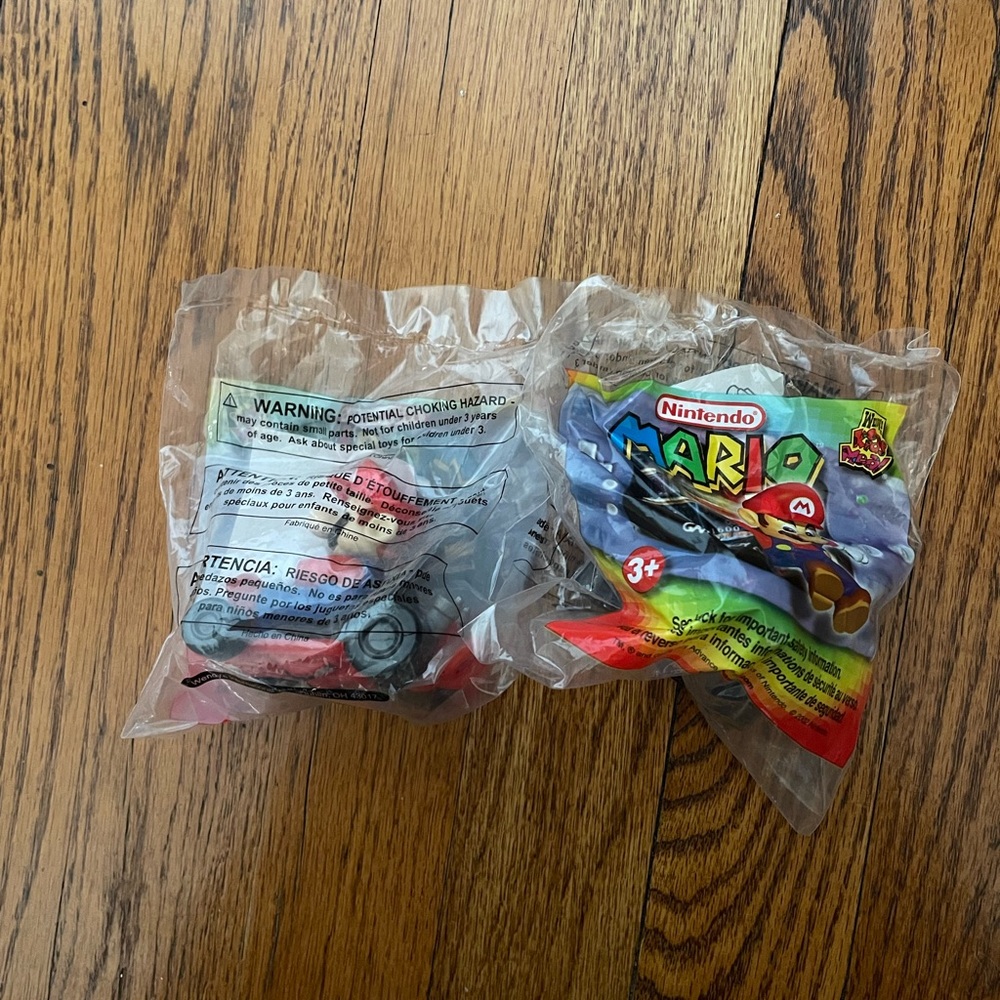 TWO New Vintage collectable nintendo Mario cart toy car with Mario